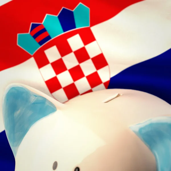 Piggy bank against national flag — Stock Photo, Image