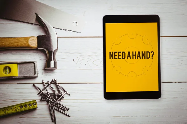 Ord behöver en hand? och tablet — Stockfoto