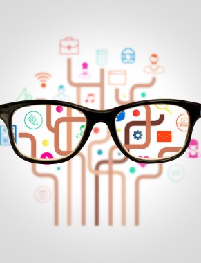 glasses against colourful app icons clipart