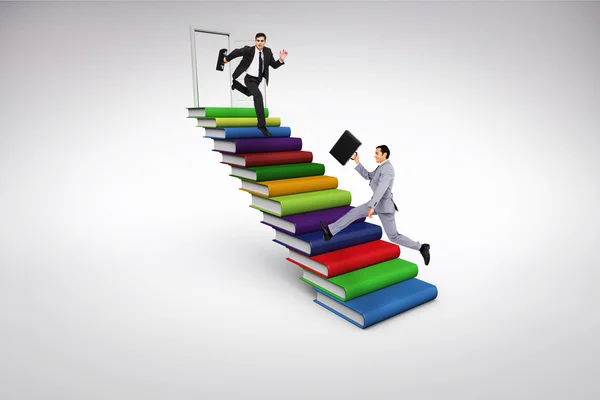 Businessmen on book stairs — Stock Photo, Image