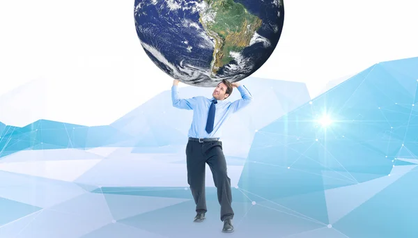 Businessman carrying the world — Stock Photo, Image