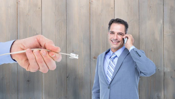 Telefon üzerinde başarılı bir iş adamı — Stok fotoğraf