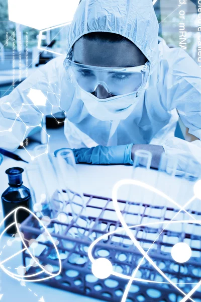 Scientist dropping liquid in test tube — Stock Photo, Image