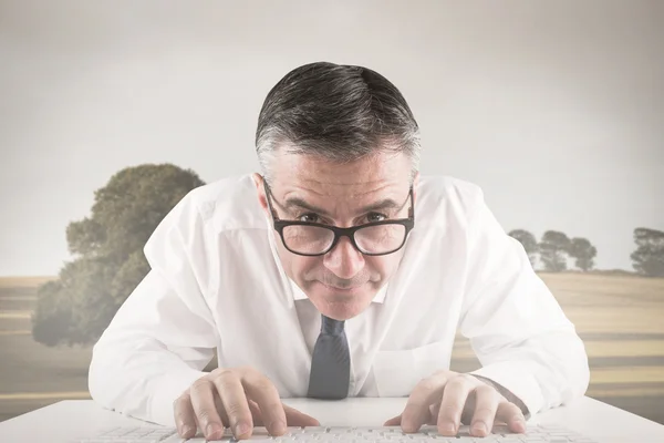 Businessman typing on keyboard — Stock Photo, Image