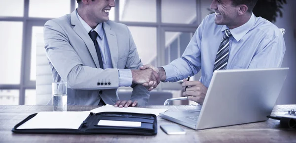 Business partners shaking hands — Stock Photo, Image