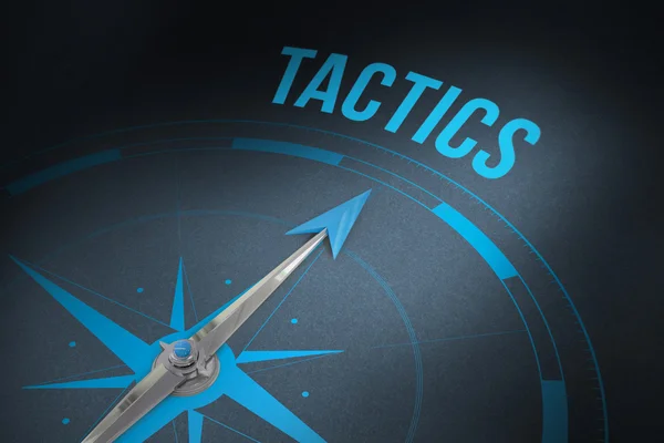 Word tactics and compass — Stock Photo, Image