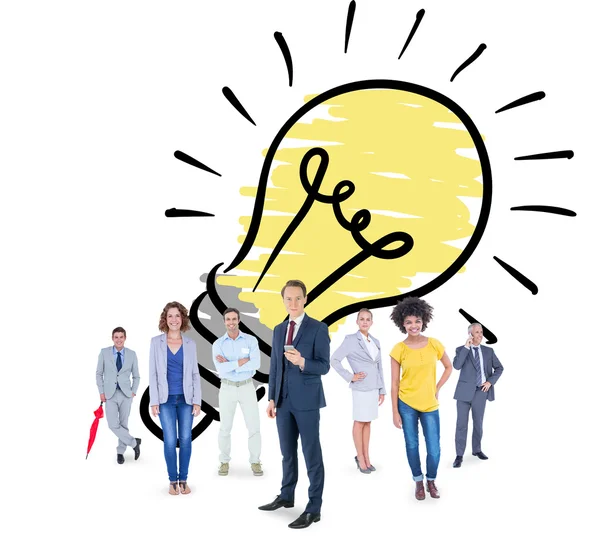 Business team against light bulb — Stock Photo, Image