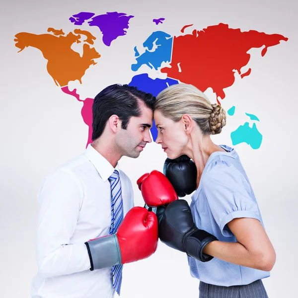 Business people wearing and boxing gloves — Stock Photo, Image