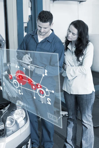 Mechanic and customer standing together — Stock Photo, Image