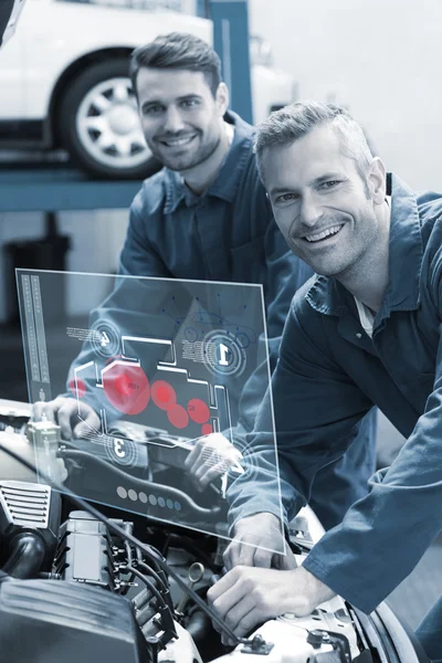 Mechanics working together — Stock Photo, Image