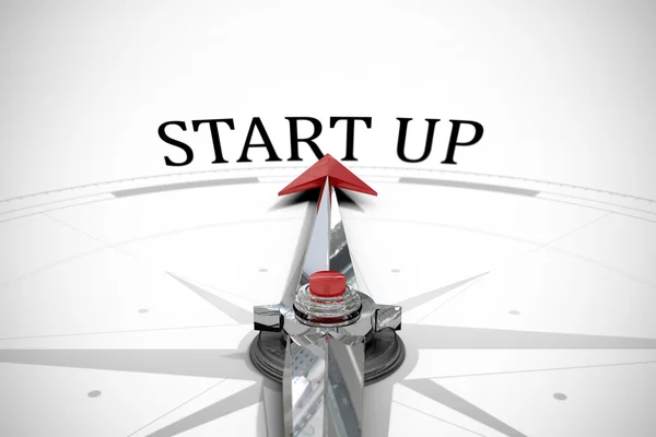 Start up against compass — Stock Photo, Image