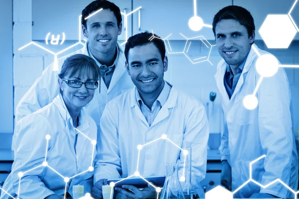 Scientists with tablet pc in the lab — Stock Photo, Image