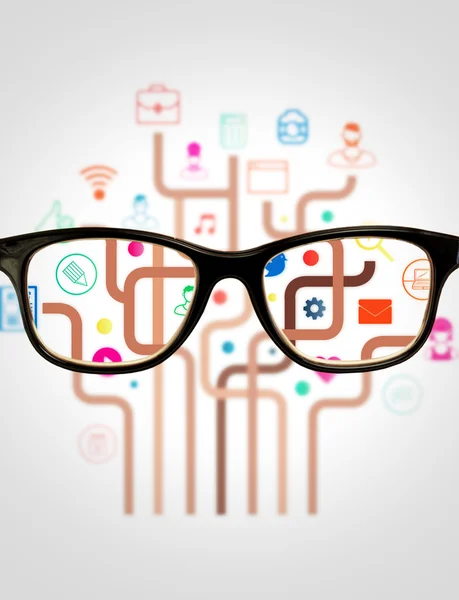 Brille gegen bunte App-Icons — Stockfoto