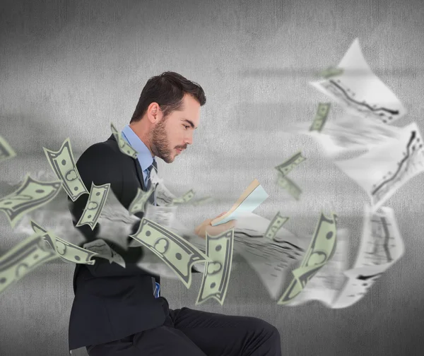 Businessman reading a book — Stock Photo, Image