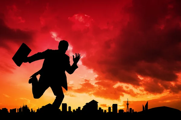 Businessman silhouette against cityscape design — Stock Photo, Image