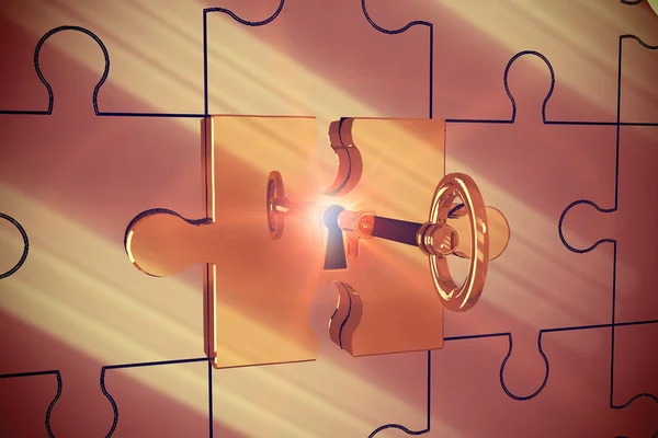 Key unlocking jigsaw — Stock Photo, Image