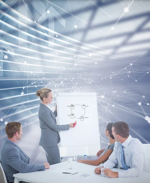 Manager presenting whiteboard to his colleagues — Stock Photo, Image