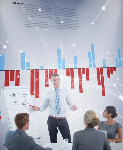 Manager presenting whiteboard to his colleagues — Stock Photo, Image