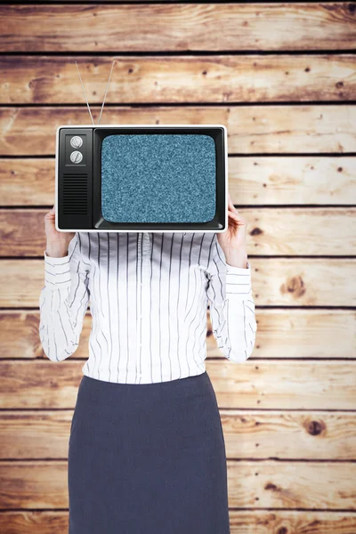 Mujer de negocios con televisión en su lugar cabeza —  Fotos de Stock