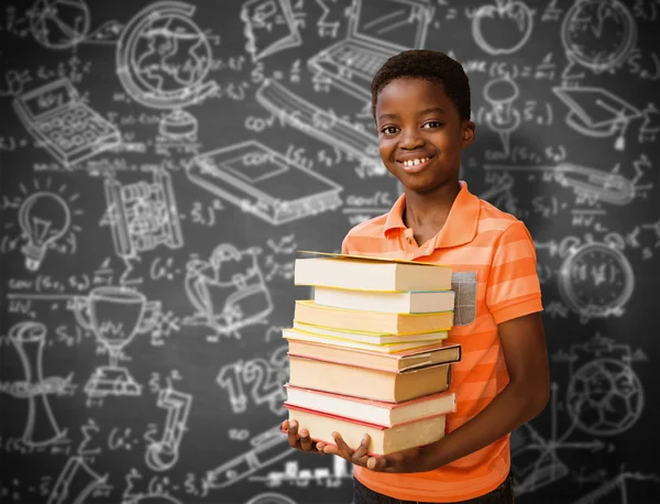 Boy carrying books — Stock Photo, Image