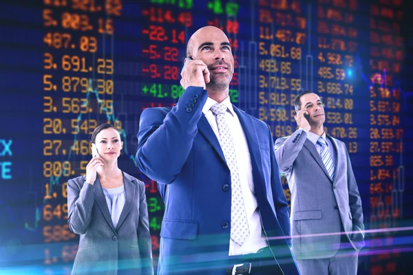 Business colleagues using phones — Stock Photo, Image