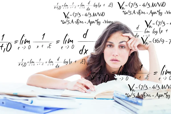 Bored student doing her homework — Stock Photo, Image