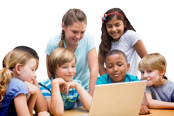 Pupils using tablet computer in library — Stock Photo, Image