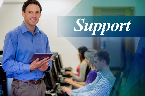 Teacher with students using computers — Stock Photo, Image