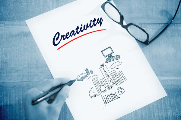 Creativity  against business and cityscape — Stock Photo, Image