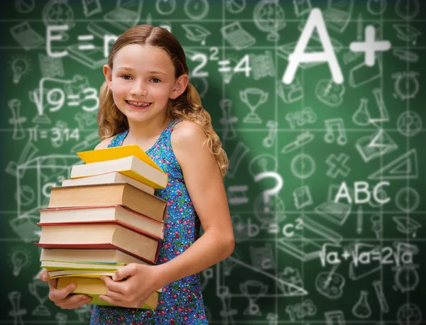 Carino bambina portando libri — Foto Stock