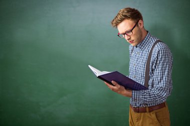 Geeky student reading a book clipart