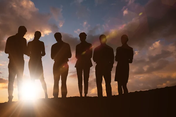 People against clouds — Stock Photo, Image