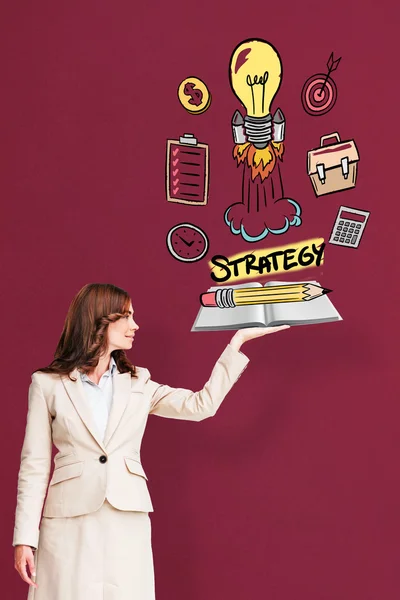 Businesswoman showing a book — Stock Photo, Image