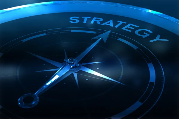 Kompas wskazuje strategii — Zdjęcie stockowe