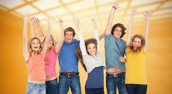 Celebrating friends jumping in the air — Stock Photo, Image