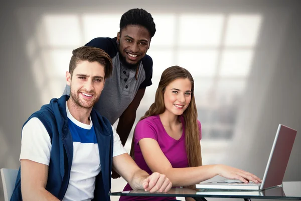 Creative team using laptop — Stock Photo, Image