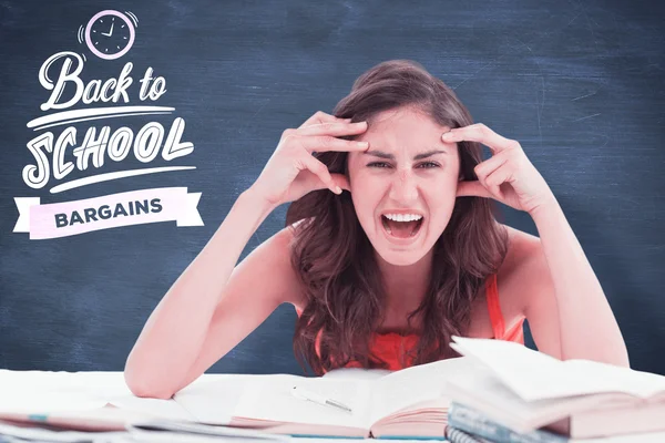 Student going  crazy doing her homework — Stock Photo, Image