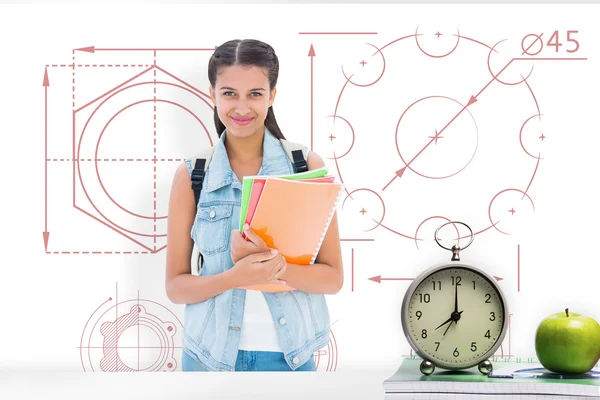 Composite image of student holding notebooks — Stock Photo, Image