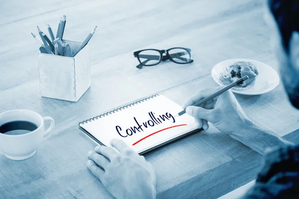 Businessman writing notes on notebook — Stock Photo, Image