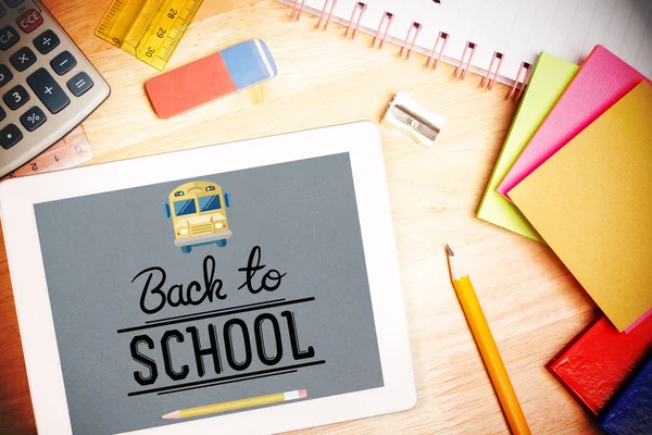 Back to school against students desk — Stock Photo, Image