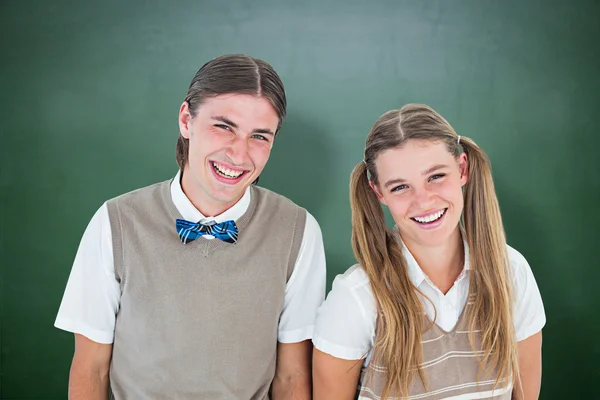 Smiling geeky hipsters — Stock Photo, Image