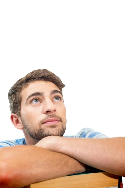 Student looking up against white — Stock Photo, Image