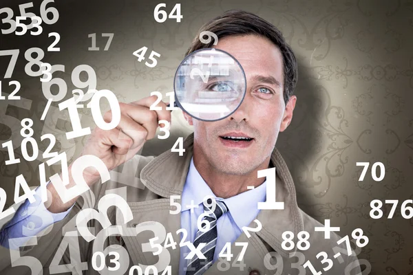 Spy looking through magnifier — Stock Photo, Image