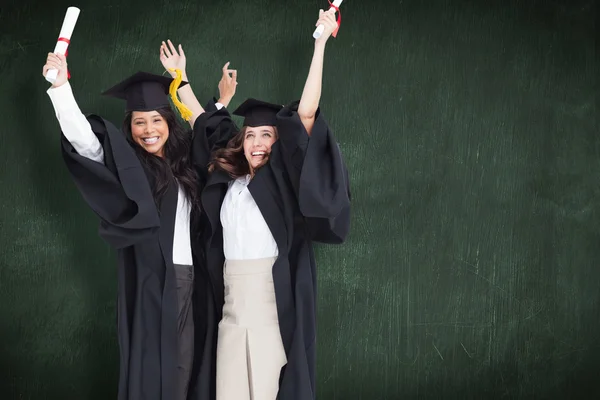 Full length of two women celebrating — Stock Photo, Image