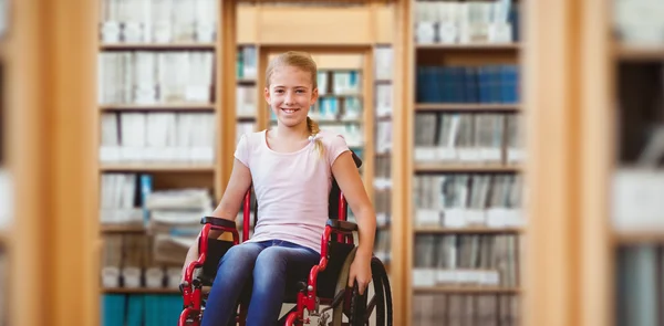Girl sitting in wheelchair — Stock Photo, Image