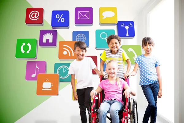 Cute disabled pupil smiling at camera with he — Stock Photo, Image