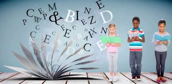 Elementary pupils reading — Stock Photo, Image