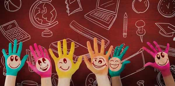 Hands with colourful smiley faces — Stock Photo, Image