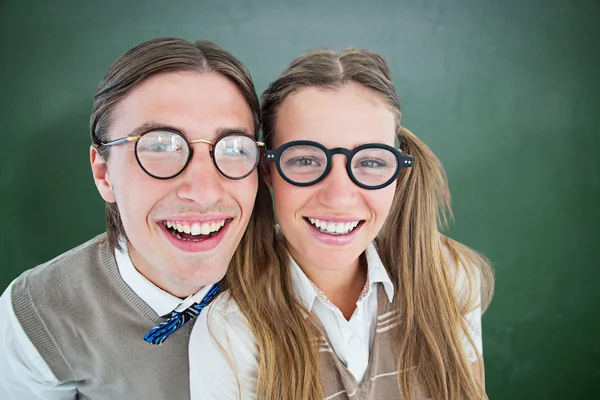Geeky hipsters smiling — Stock Photo, Image