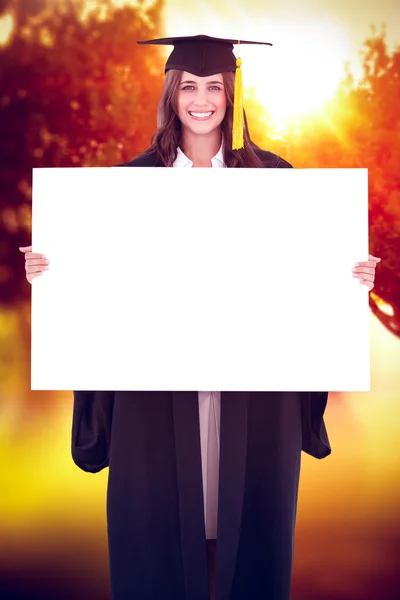 Woman holding a blank sheet — Stock Photo, Image